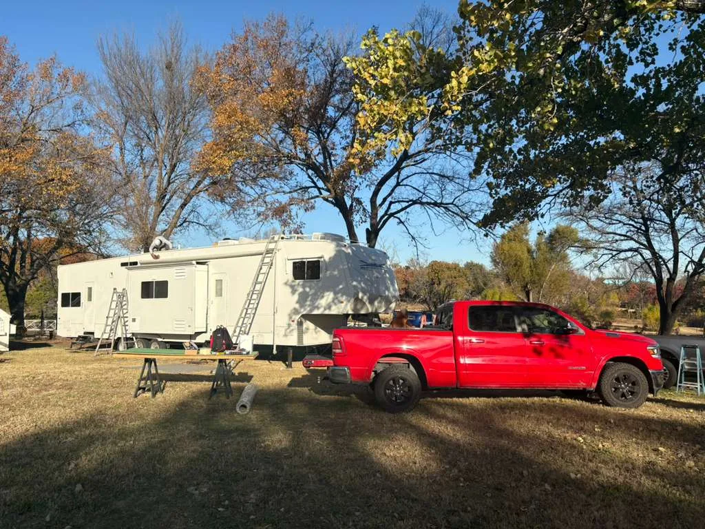 Coast to Coast RV mobile service truck arriving at a Ocoee campsite