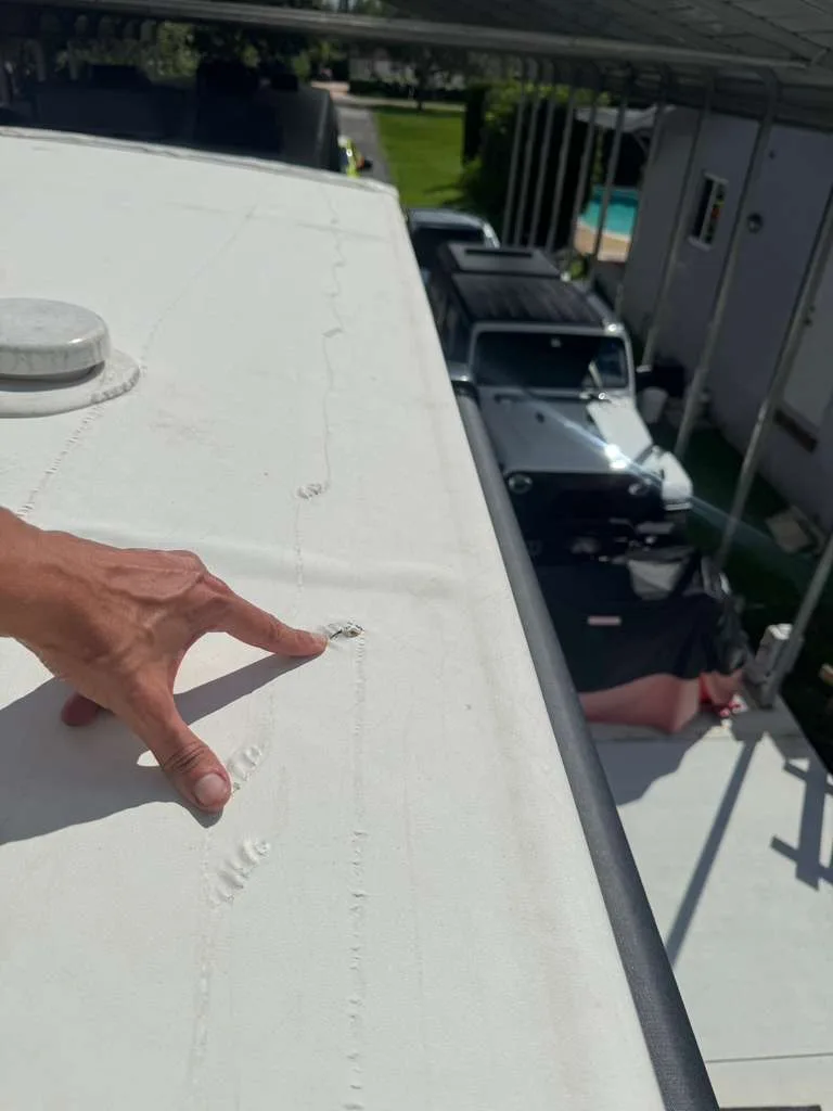 Patching and sealing holes in an aging RV roof membrane