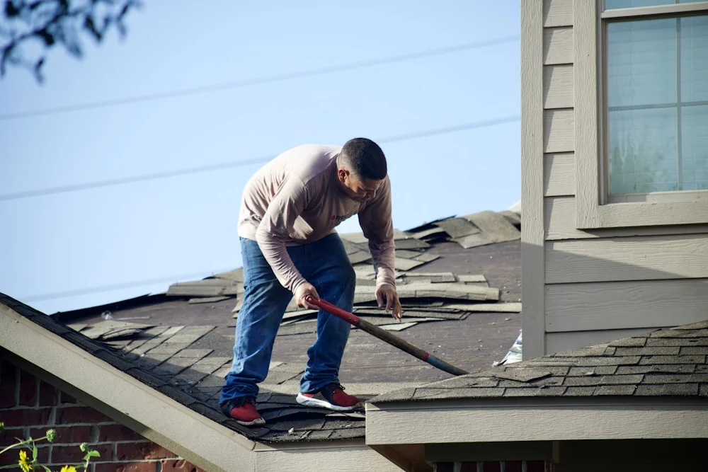 RVIA-certified inspector walking an RV roof checking Dicor sealant in Florida